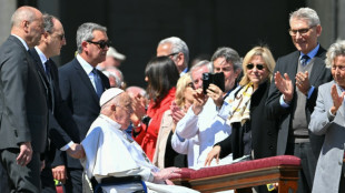 Recovering Pope surprises crowd at Vatican square