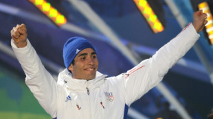 Biathlon: sixième titre olympique pour Fourcade, 15 ans après Vancouver