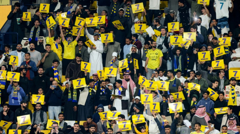  Fans cheer for absent Ronaldo as Saudi row deepens 