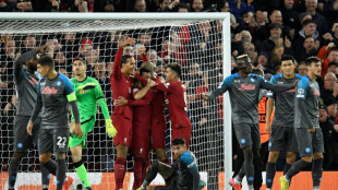Liverpool end Napoli's unbeaten run but fall short of top spot