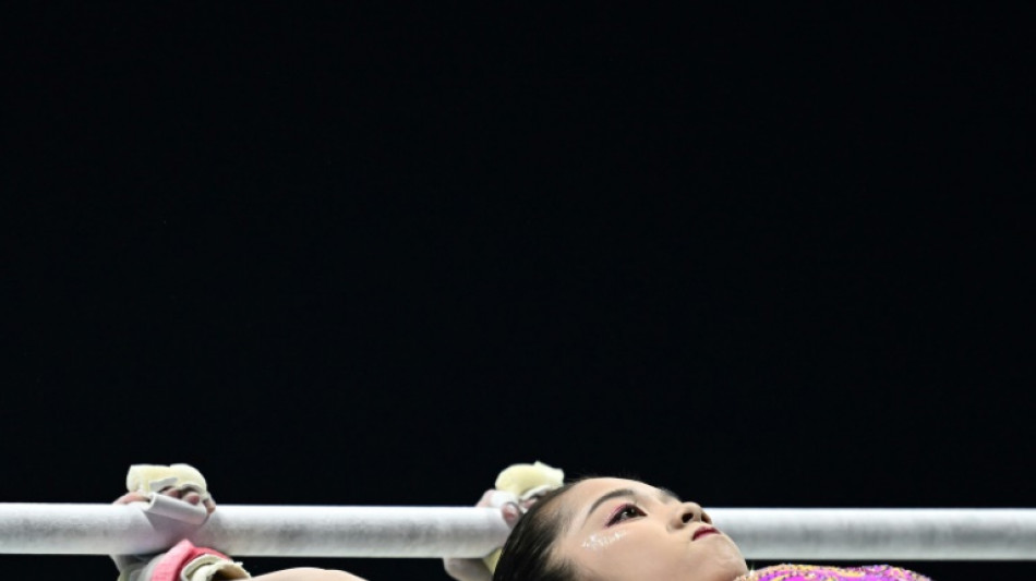 Wei revalida el oro mundial en barras asim&eacute;tricas, Andrade octava