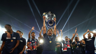 Jubilant PSG party into night with Champions League trophy
