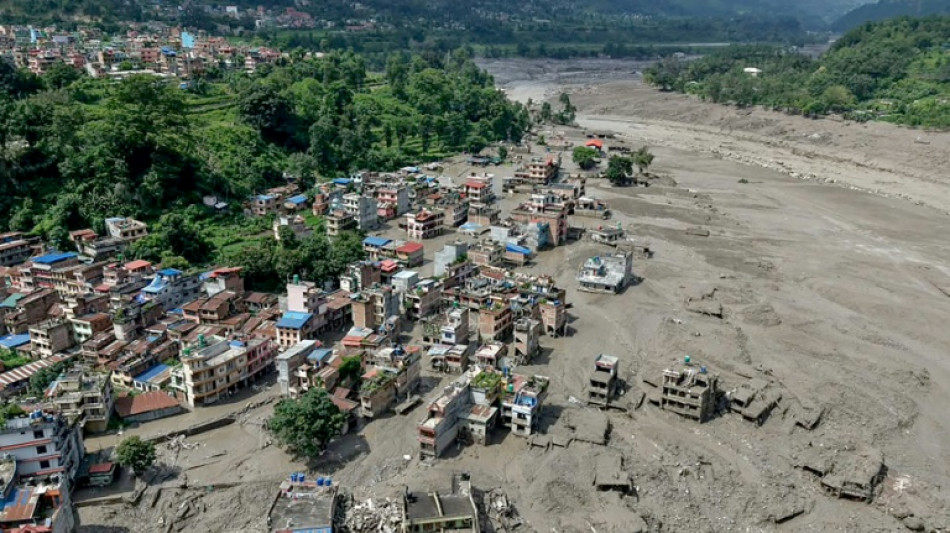  Search for missing after Nepal-Tibet floods kills at least 160 