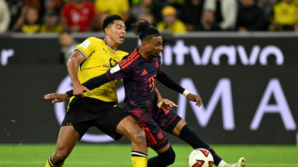  Olise helps Bayern past Dortmund in German Supercup 