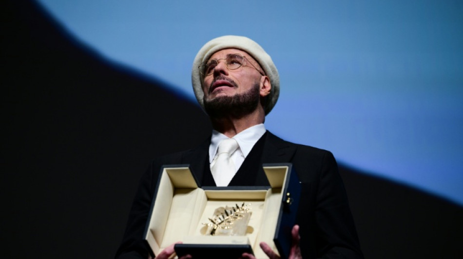  'Beyond the Oscar': Travolta gets surprise Cannes prize 