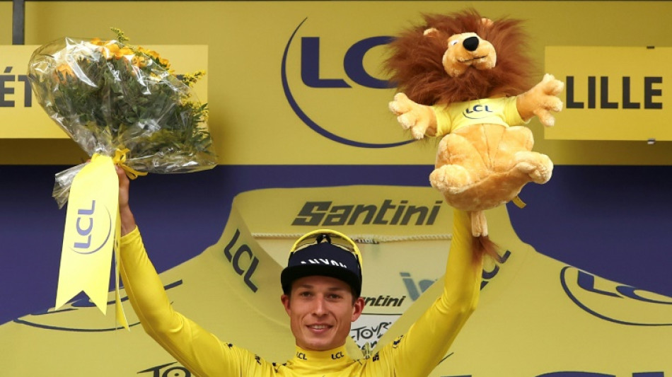 Philipsen wins nervy Tour de France opener as Evenepoel loses time