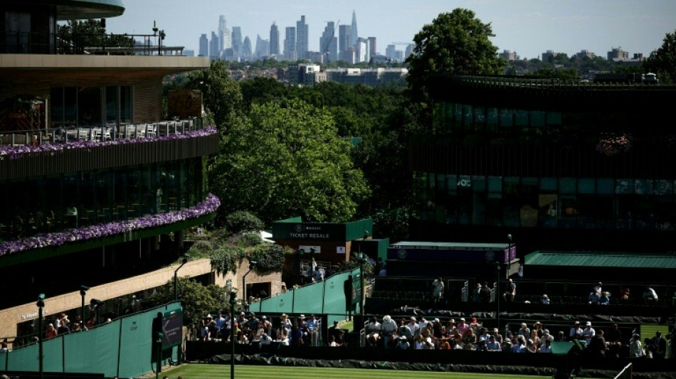  Tennis players end Wimbledon prize-money protest 