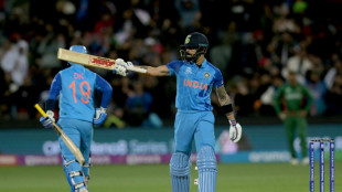 Kohli stars as India beat Bangladesh to stand on brink of T20 semi-finals