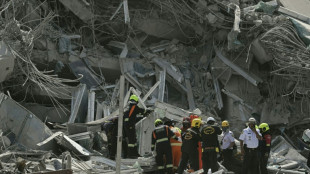 Panic on the streets of Bangkok as quake collapses skyscraper
