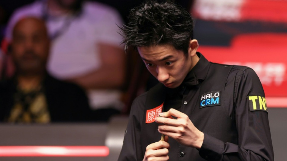  China's Wu holds slender lead in World Snooker Championship final 