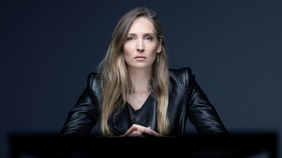  Ex-model accuses French scout of grooming her for Epstein 