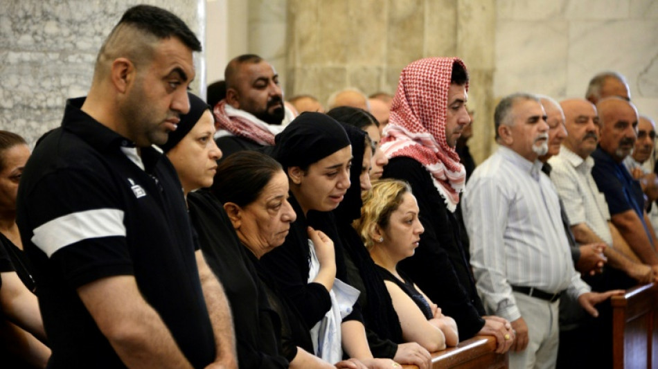 Irak: messe &agrave; Qaraqosh pour les victimes de l'incendie lors d'un mariage