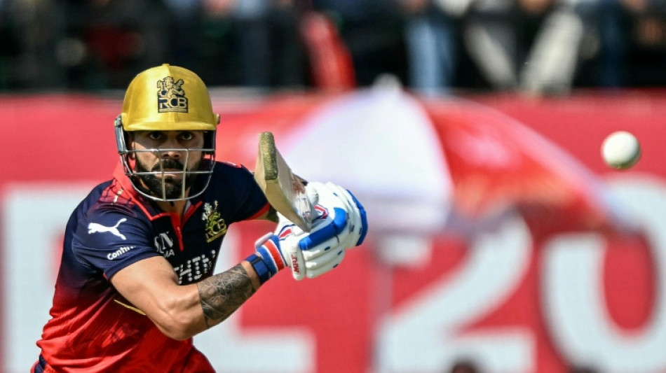  Kohli, Venkatesh dazzle as Bengaluru qualify for IPL play-offs 