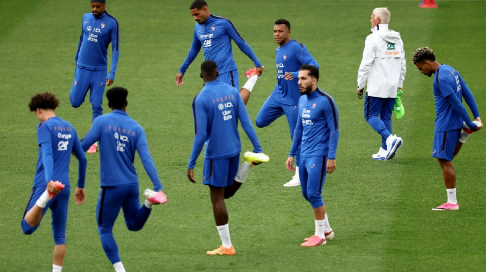  France's Saliba 'fine' after injury scare, says Deschamps 