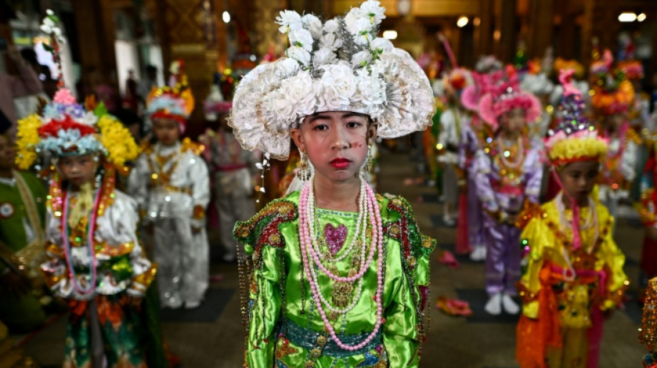 Flowers in their hair: Shan boys ordained into Buddhist monkhood