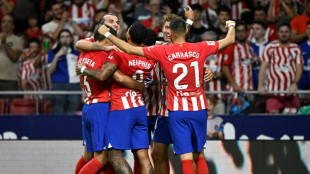 El Atl&eacute;tico de Madrid golea 3-1 al Granada en su debut liguero y se pone l&iacute;der