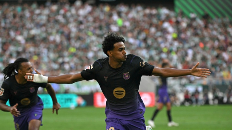  Unstoppable Barca thrash Betis to extend perfect start 